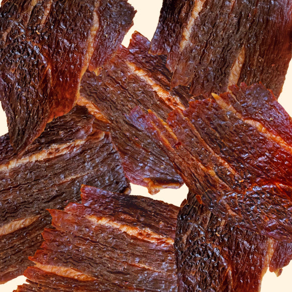 Teriyaki flavored crispy beef jerky from Hawaii infused with sweet and savory teriyaki sauce with a hint of chipotle heat. These Jerky Crisps are made with premium quality beef and are keto-friendly and high in protein, which makes a healthy on-the-go snack.