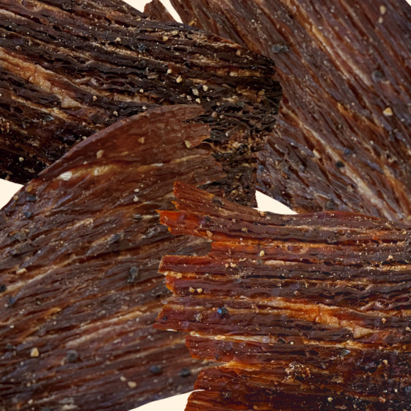 Pepper crispy beef jerky from Hawaii with cracked black pepper and natural smoke flavoring. These Jerky Crisps are made with premium quality beef and are keto-friendly and high in protein, which makes a healthy on-the-go snack.